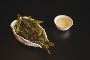 A side dish of green beans paired with a refreshing drink on the table