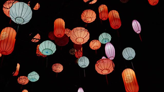 Bright Chinese style lanterns in the night sky