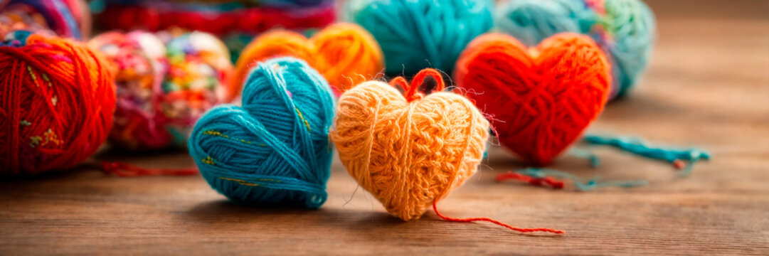 Knitting heart threads is beautiful. Selective focus.