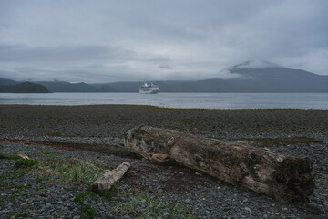 Luxury cruiseship cruise ship liner Regatta anchored in Sitka Bay, Alaska on foggy low hanging...