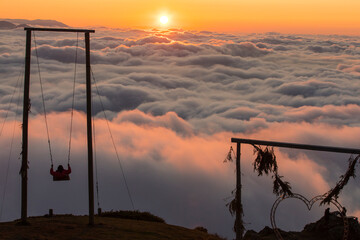 Swinging (Salincak) in the Sea of ​​Cloud at Sunset, Huser Plateau (Huser Yaylası) Çamlıhemşin Rize, Turkiye (Turkey)