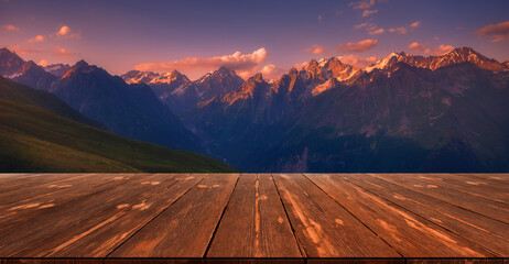 Beautiful mountains with empty wooden table. Natural template landscape