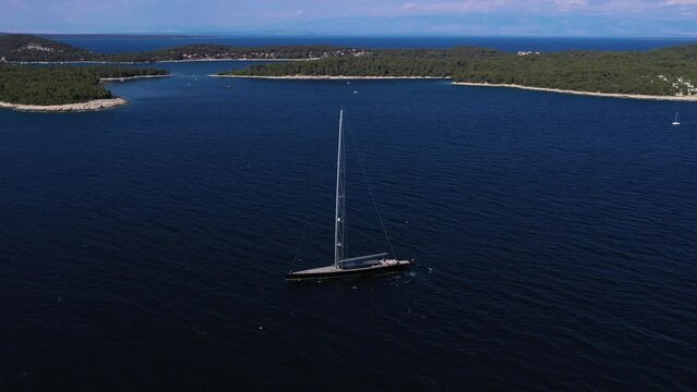 Aerial view of serene Zara coastline and sailing boats on turquoise waters, Zara, Croatia.