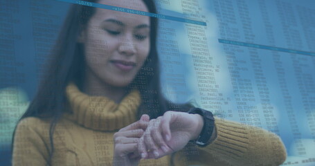 Image of data processing over biracial woman using smartwatch