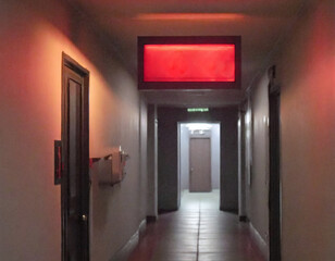 Urgent Direction in Dimly Lit Corridor