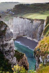 coastal landscape along the Falaise d'Aval the famous white cliffs of Etretat village