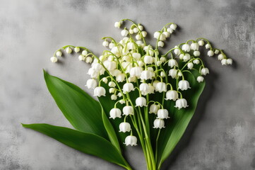 Fresh Lily of the Valley on Grey Surface