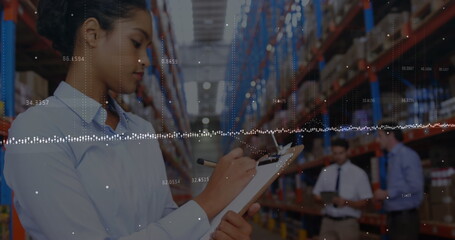 Image of financial data processing over diverse business people in warehouse