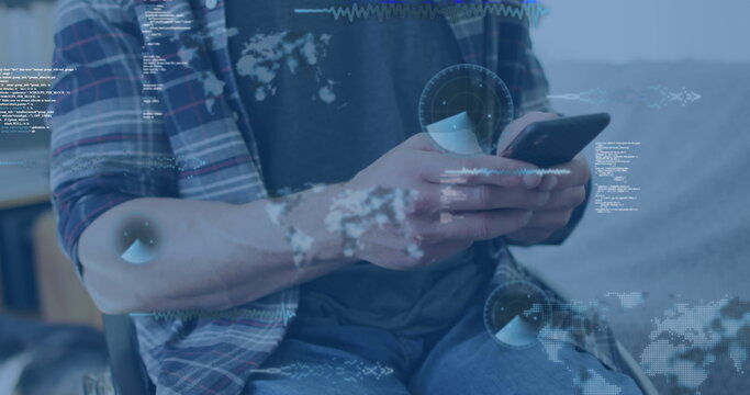 Image of data processing over disabled cuacasian man sitting in wheelchair using smartphone