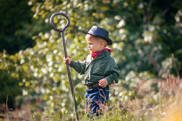 Cute Little Boy with Hat and Shepherd's Staff  - 741397623