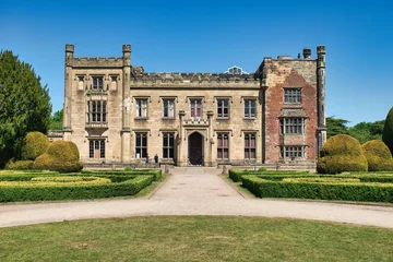 Foto op Canvas Elvaston, Derby, Derbyshire, England, UK. June 20, 2020 Front view of Elvaston Castle on a sunny day with surrounding green parkland and blue sky. This was during the Covid 19 Pandemic. © Scotts Travel Photos