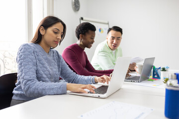 Diverse team working together in a modern office