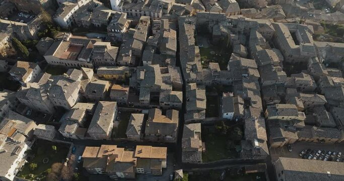 Aerial view of Orvieto at sunset, a small town perched on the rock cliff in Umbria, Terni, Italy.