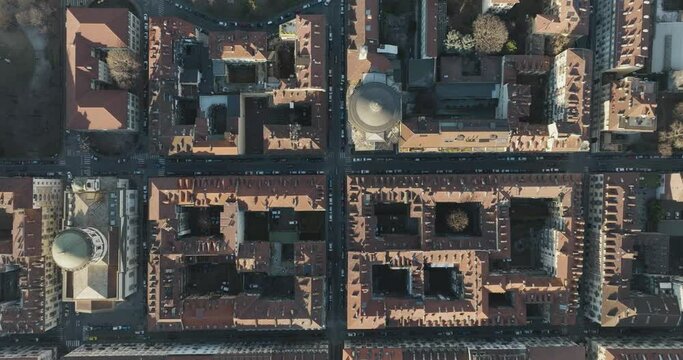 Aerial top down view of rooftops in Turin downtown at sunset, Turin, Piedmont, Italy.