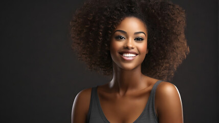Stock photo of beautiful black woman smiling and having in studio shot
