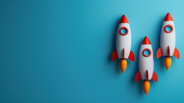 three rocket on blue background for copy space