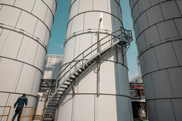 Barrels silo stock chemical products The metal barrels are white.Manufacture of chemicals