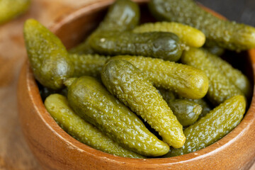 green pickled cucumbers on the table