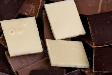 white, bitter and milk chocolate pieces
