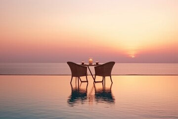 Romantic dining table setup for two, overlooking a serene seascape with a sunset backdrop. Sunset Seascape with Dining Setup
