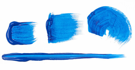 Various strokes of blue oil paint on a white background