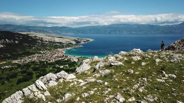 Aerial view of Baska village and its beautiful bay with clear turquoise water, Krk island, Croatia.