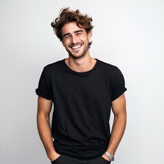 Obraz premium Attractibe young man laughing wearing black isolated on white background