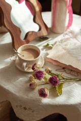 morning cup of coffee on the decorated table 