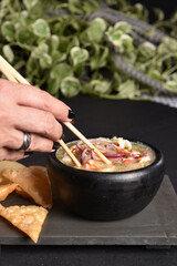 ceviche raw fish food with lemon onion pepper and lemon, healthy food