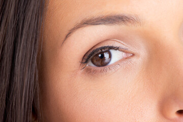 Woman, eye and portrait closeup with eyebrow microblading and grooming treatment with makeup....