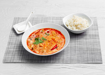 Tom yum soup with shrimp, mushrooms and rice. Asia food.