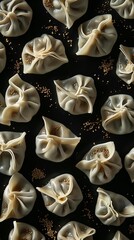 Georgian cuisine. Khinkali on a black background. View from above. High resolution