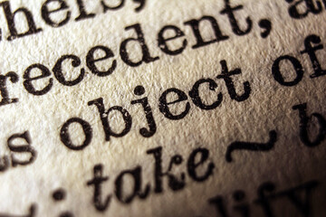 Word object printed on book page, macro close-up	
