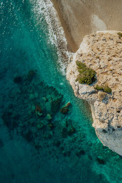 Aerial View of Aphrodite's Rock Beach and Cliffs