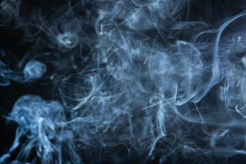 Within the darkness, abstract smoke patterns rise, stimulating the imagination and prompting...