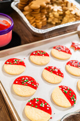 Decorating with Red Melted Chocolate and Vibrant Green Sprinkles