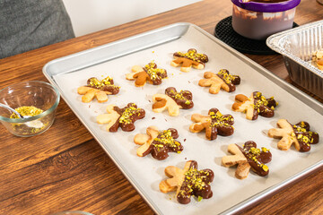 Making Holiday Star Cookies, Chocolate-Dipped with Pistachio Topping