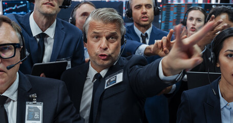 Portrait of Professional Traders Working on Stock Exchange. Enthusiastic Men and Women Shouting,...