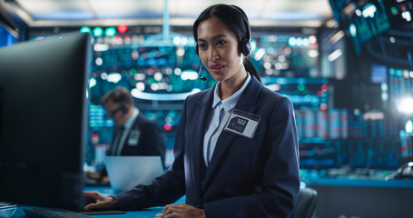 Portrait of a Young Asian Female Working in an International Stock Exchange Company: Trader...