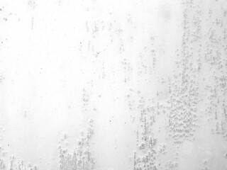 Steel texture metal sheet background with peeling white paint.