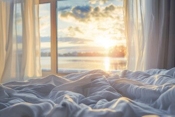A cozy bedroom awaits with warm linens and a view of the sun setting through the window, beckoning for a peaceful night's sleep