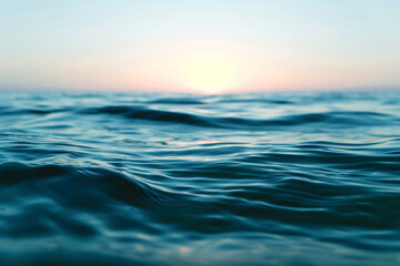 Obraz premium Serene ocean waves captured at sunset under a gradient sky