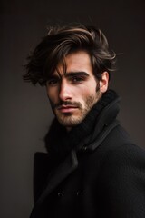 Fototapeta premium portrait of young handsome man fashion model, confident stylish guy posing studio shot, male with casual hairstyle