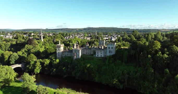 A picturesque castle at sunset. Lismore Castle in 4k
