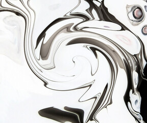 Beautiful fluid art of swirl pattern with black acrylic paint on white background  