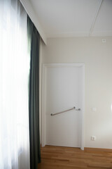 Door in a hotel for disabled people. Barrier-free environment.
