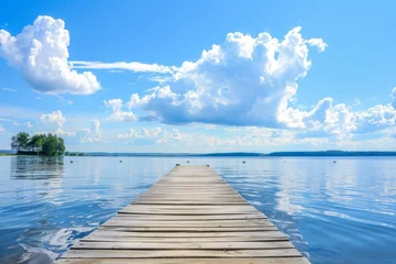 Papier Peint photo autocollant Descente vers la plage A serene landscape with a wooden dock stretching into the calm waters of the lake, framed by billowing clouds and a lush tree-lined shore