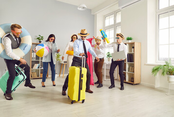 Corporate business team going on summer holiday together. Group of happy friends in sun hats, with...
