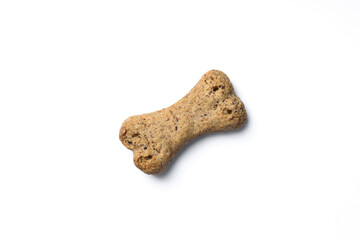 Top view of crunchy bone shaped dog biscuit set isolated on white background close up