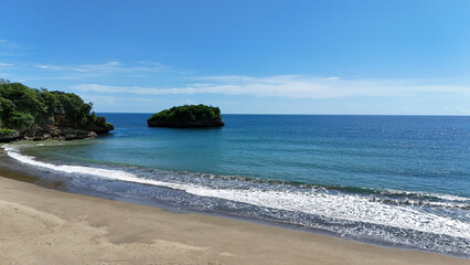 Aerial landscape view of tropical summer palm trees shadows on sandy coast ocean waves splash crash. Beautiful top view sunny sea coast, exotic amazing nature landscape